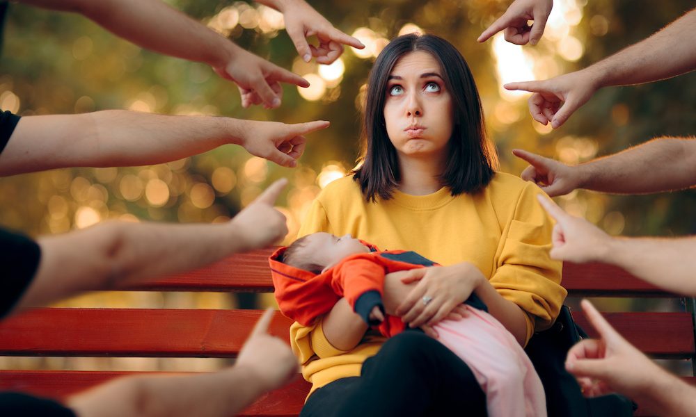 Mommy Shaming Concept Portrait of a Mother and her Baby Interview: Why motherhood support is lacking – and what can be done