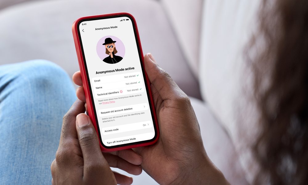 Young,Black,African,Woman,Holding,Smartphone,In,Hand,With,White Flo’s Anonymous Mode goes live in a bid to improve data security for millions of users