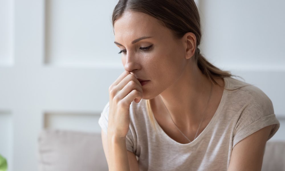 Upset young woman feel depressed thinking at home Kate Middleton’s cancer diagnosis could ‘inspire change’ in women’s health
