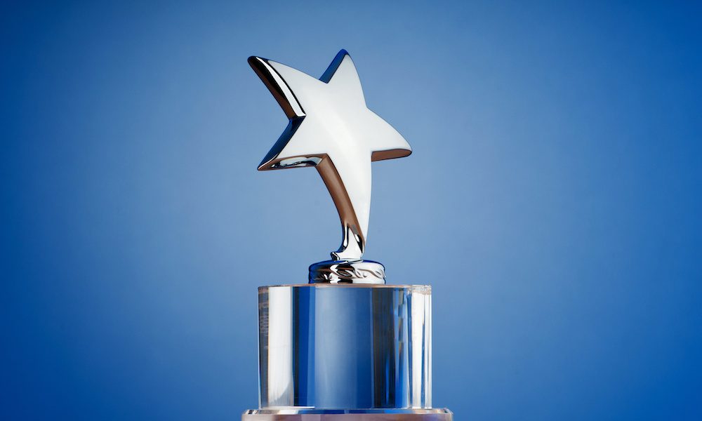Star award against gradient background Femtech World Menopause Innovation shortlist revealed
