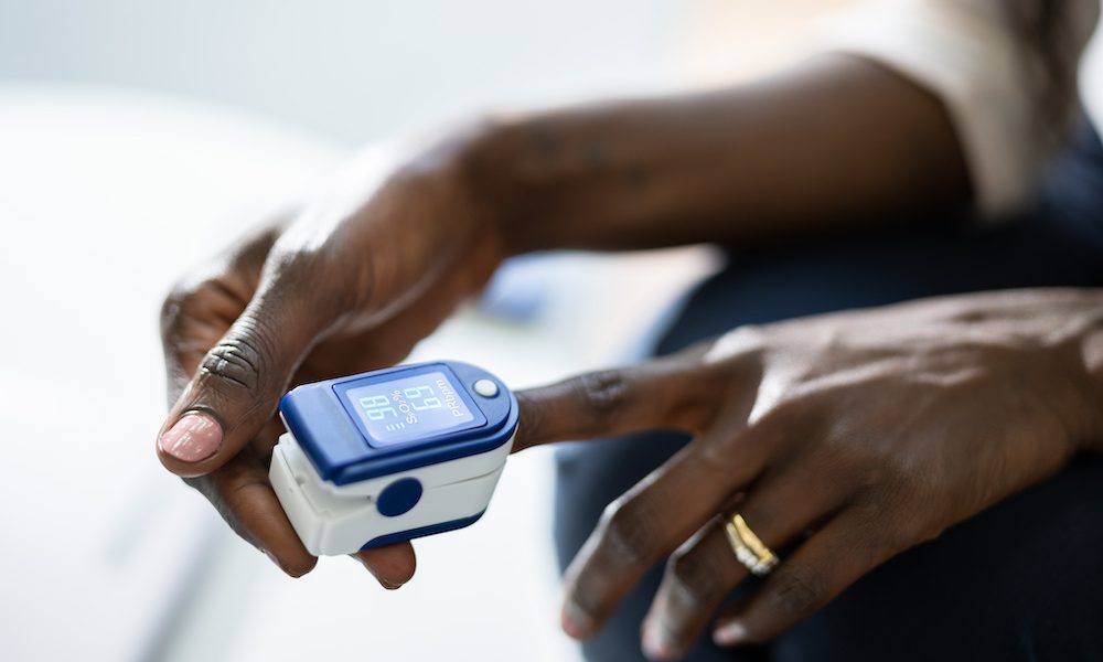 African Hand Pulse Heart Rate UK government to tackle ethnic and other biases in medical devices