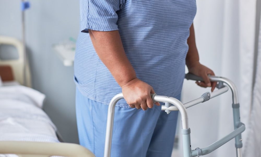 Close up of black senior woman leaning on walker support in hospital room ‘Deeply concerning’: experts react to ‘shocking’ women’s health report