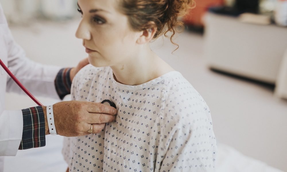 Physician doing a checkup on a patient AI breakthrough challenges the myth that heart disease is a male issue