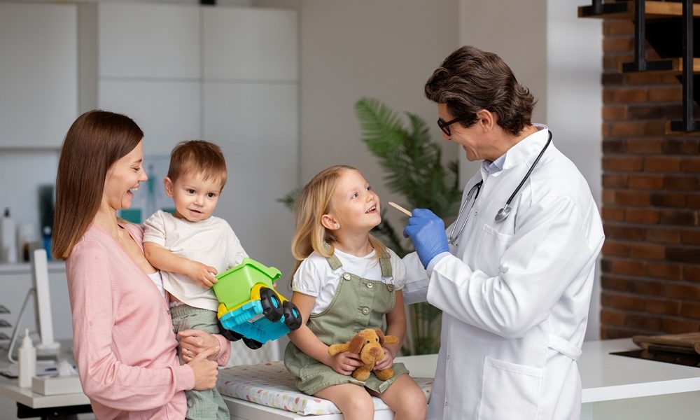 young-mother-with-two-children-doctors-appointment Design-led platform technologies tackling fertility and early childhood health
