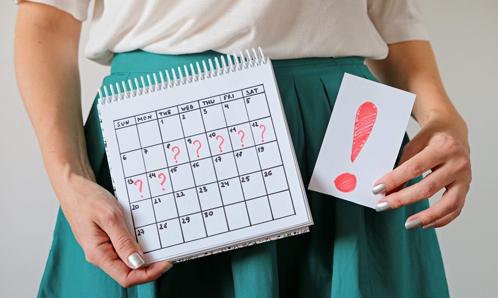 woman-holding-calendar-with-marked-missed-period-exclmation-mark-unwanted-pregnancy-delay-menstruation Petition urges Government to introduce menstrual leave