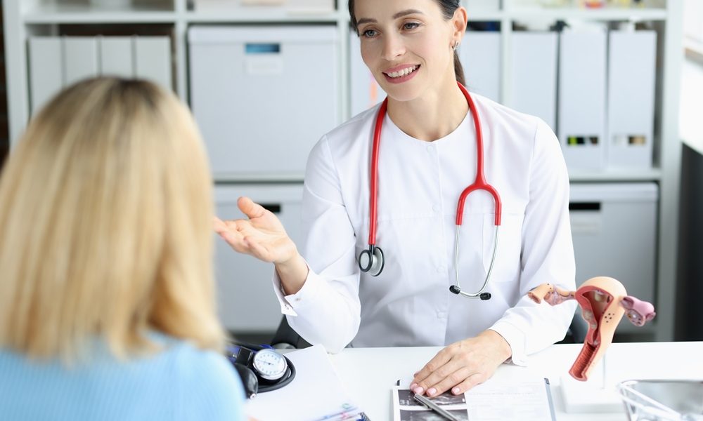 gynecologist-doctor-consults-woman-clinic-diseases-female-reproductive-system-uterus NICE issues fertility guidance for people with endometriosis