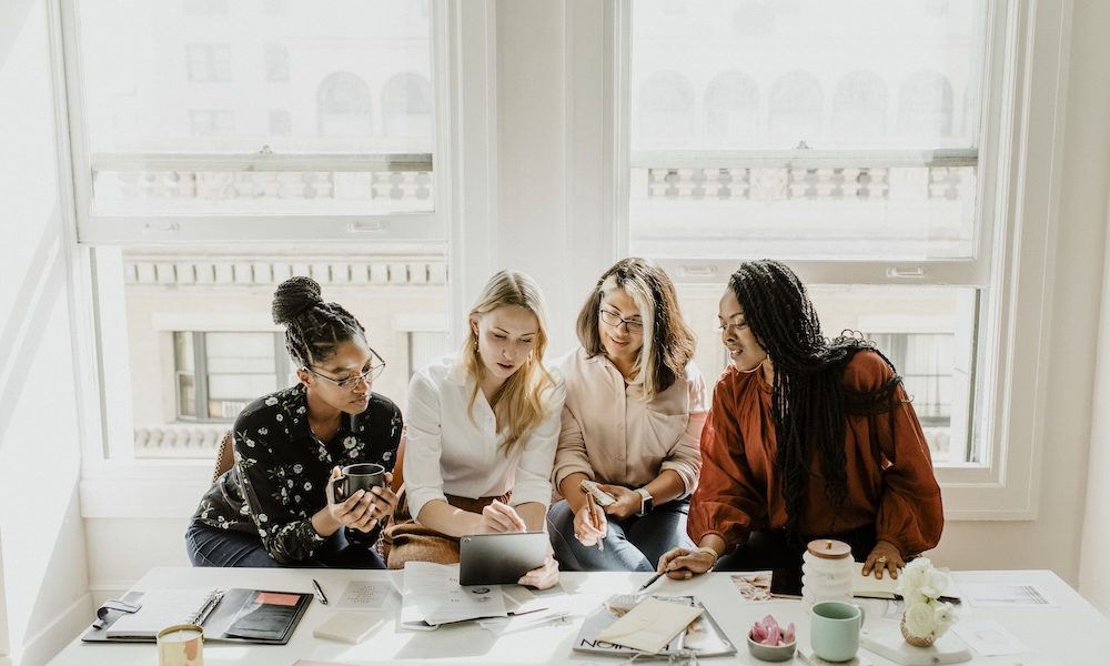 Happy diverse businesswoman using a digital tablet Female-led startups expanding despite lack of structured support, research finds