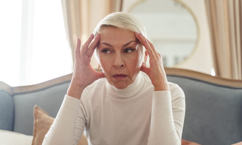 waist-up-portrait-discontented-irritated-aged-caucasian-lady-keeping-her-hands-temples Menopausal hormone therapy may lower dementia risk, study suggests